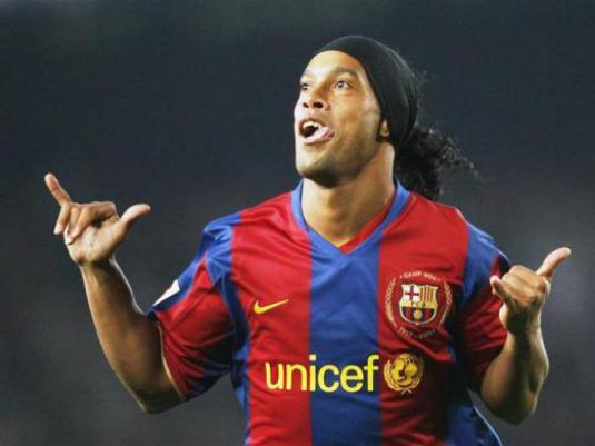 Where does Ronaldinho play?