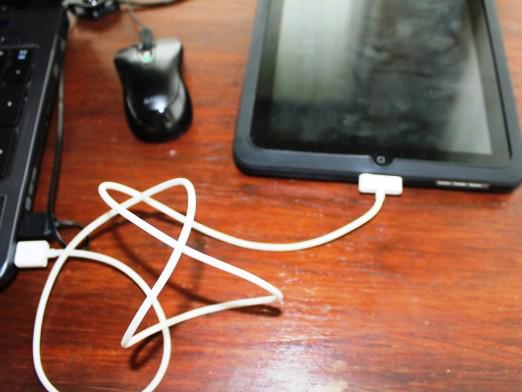 How do I charge an iPad?